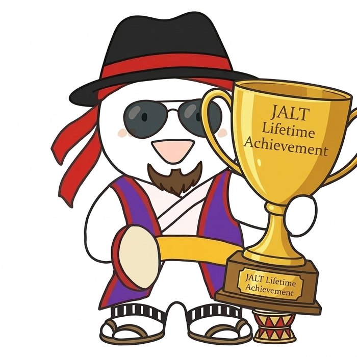 Okinawa JALT mascot holding the JALT Lifetime Achievement trophy