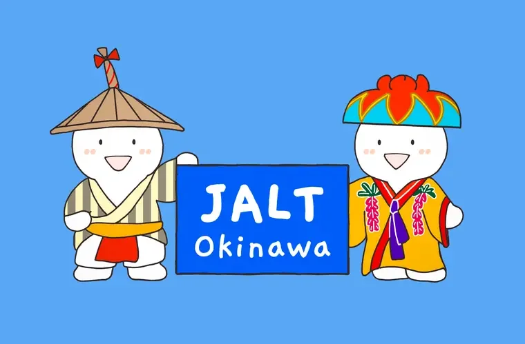 Okinawa JALT mascots Nini and Nene holding a JALT Okinawa sign
